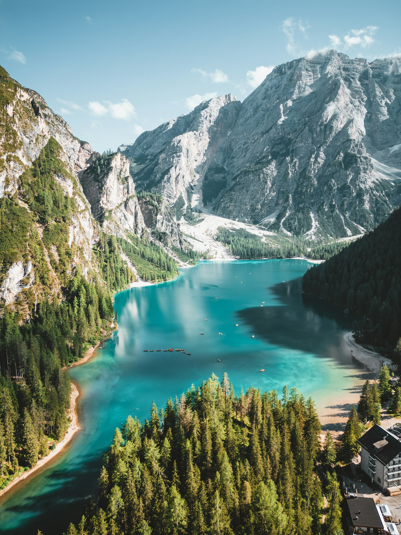 Turquoise Lago di Braies surrounded by the Italian Dolomites