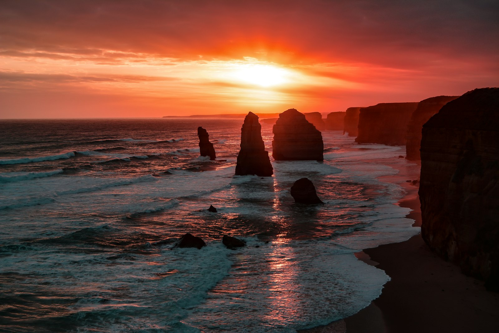 The Twelve Apostles limestone stacks along Australia’s Great Ocean Road at sunset